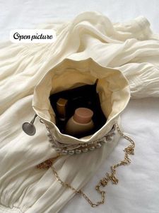 Elegant Pearl Embellished Jute Sling Bag