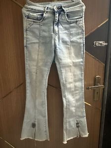 Light Wash Flared Jeans with Zipper Detail