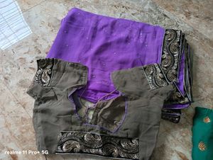 Elegant Purple Saree with Intricate Border