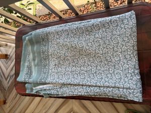 Elegant Teal Saree with White Print