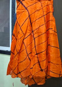 Vibrant Orange Ethnic Skirt with Tie-Dye Pattern