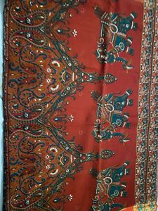Elegant Red Saree with Elephant Print