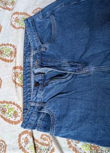 Distressed Blue Denim Jeans