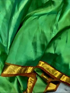 Green pure kanjivaram silk saree.