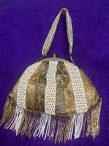 Anekaant Gold-Toned Embellished Tasselled Clutch