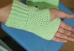 Crocheted hand warmer and spiral