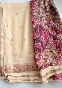 dark cream saree with beautiful India bordering