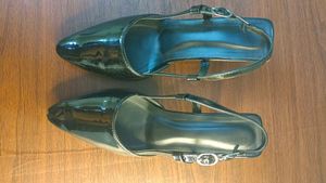 Black pointed heels with adjustable band