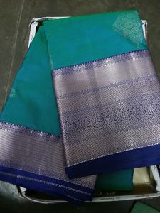 Elegant Teal Saree with Silver Zari Border