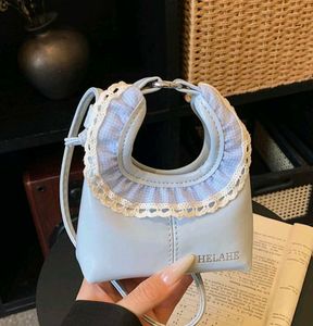 Chic Pastel Blue Ruffled Handbag