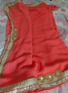 Beautiful Orange/coral Saree with Golden Border