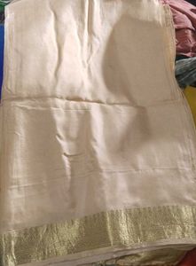 Elegant Cream Saree with Golden Border