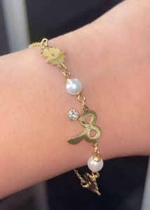Anti Tarnish Gold Charm Bracelet with Pearls