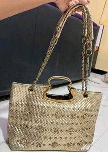 Elegant Gold Embellished Handbag