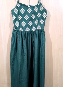 Green Embroidered Maxi Dress with golden jacket