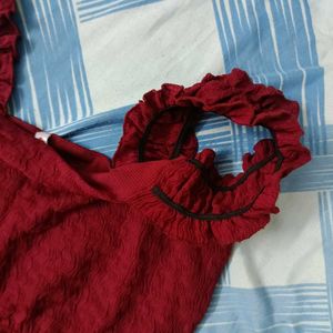 Maroon textured sleeveless top