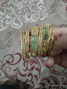 Elegant Gold Bangles with Gemstones
