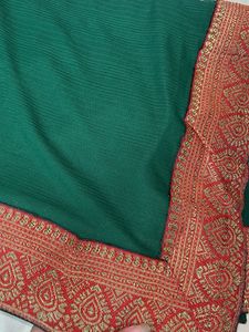 Elegant Green Saree with Red Border