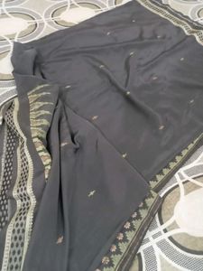 Elegant Grey Saree with Intricate Border