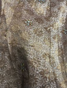 black kurti with golden lehga