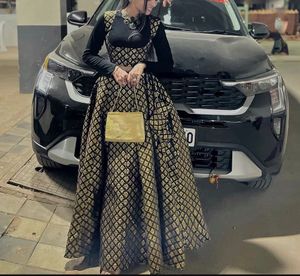 Elegant Black & Gold Brocade Lehenga Set