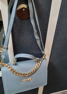 Stylish Light Blue Handbag with Gold Chain