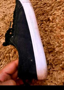 Black Canvas Sneakers available in coins