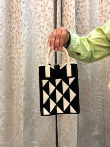 Chic Black &amp; White Geometric Handbag