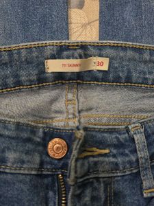Distressed Blue Denim Jeans