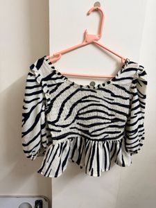 Zebra Print Peplum Top