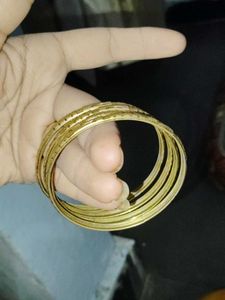 Set of Golden Bangles and 1 singe bange watc