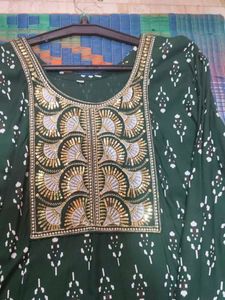 Elegant Green Kurta with Embellished Neckline