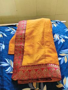 Vibrant Yellow Saree with Red Border
