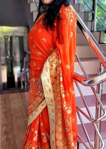 Gorgeous Orange Embroidered Saree With Blouse