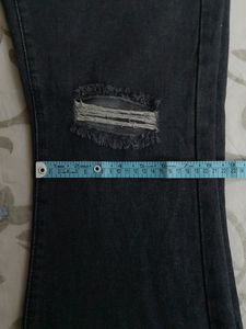 URBANIC HEAVY DISTRESSED BOOTCUT BLACK JEANS