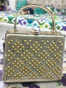 Elegant Beaded Silver Clutch