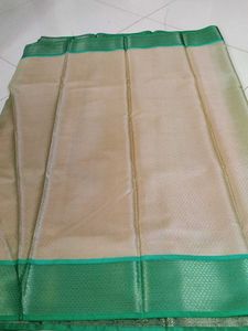 Elite orange green saree...