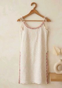 Sleeveless white kurti trending