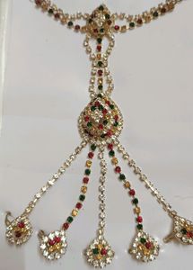 Bracelet With Attached Finger Ring
