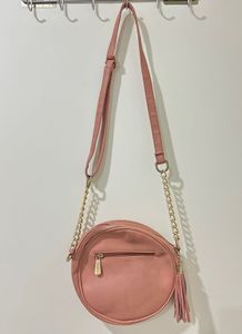 Round Perforated Crossbody Bag