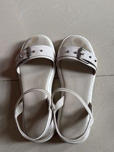 Stylish White Flat Sandals with Buckle Detail