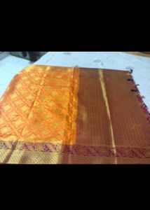 Orange Silk Saree with Gold Border