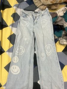 Washed light blue smiley jean