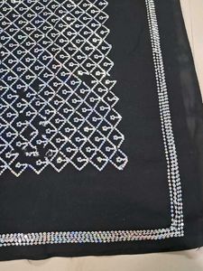 Elegant Black Saree with Silver Embellishments