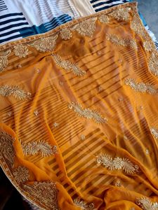 Elegant Orange Embroidered Saree