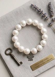 Elegant Pearl Bracelet with Butterfly Charm