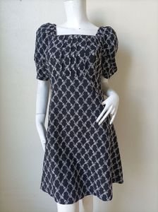 Chic Black & White Patterned Mini Dress