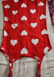 red colour camisole with heart shape pattern