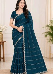Elegant Teal Saree with Silver Border
