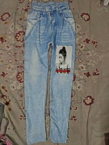 Light Wash Distressed Jeans with Pearl Detail